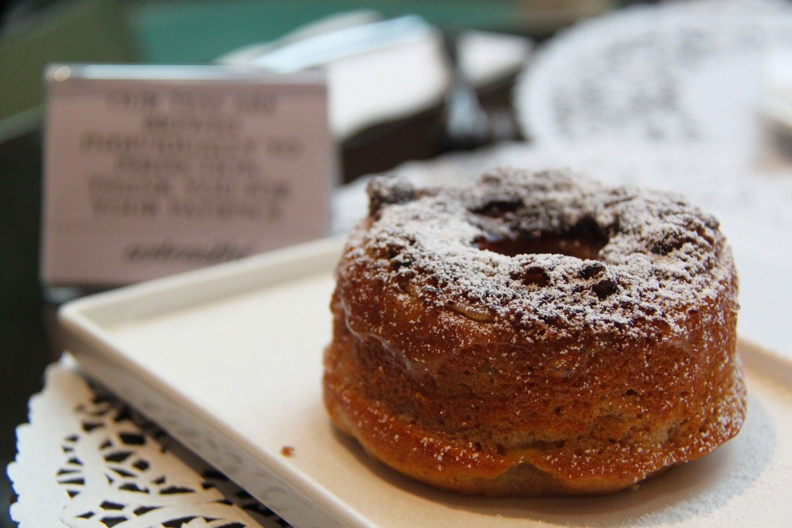 A thick donut with just the right amount of icing sugar awaits you here.Pumpkin Spice and everything nice.